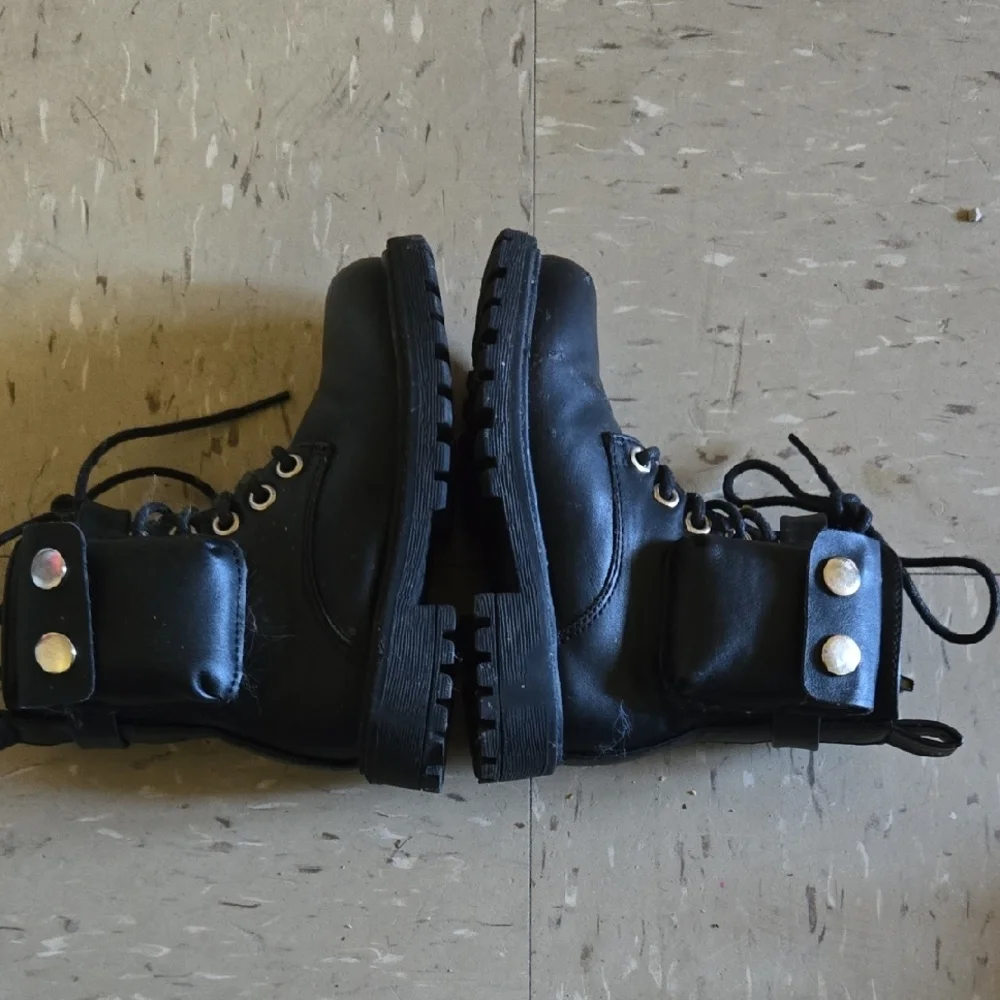 Black Leather Combat Boots with Lace-Up Design - Picture 6 of 6
